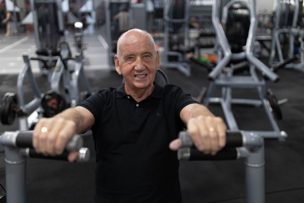 A client of Team Marcia engaging in strength exercises at Virgin Active The Sanctuary in Somerset West, building essential muscle strength to support vitality at any age.