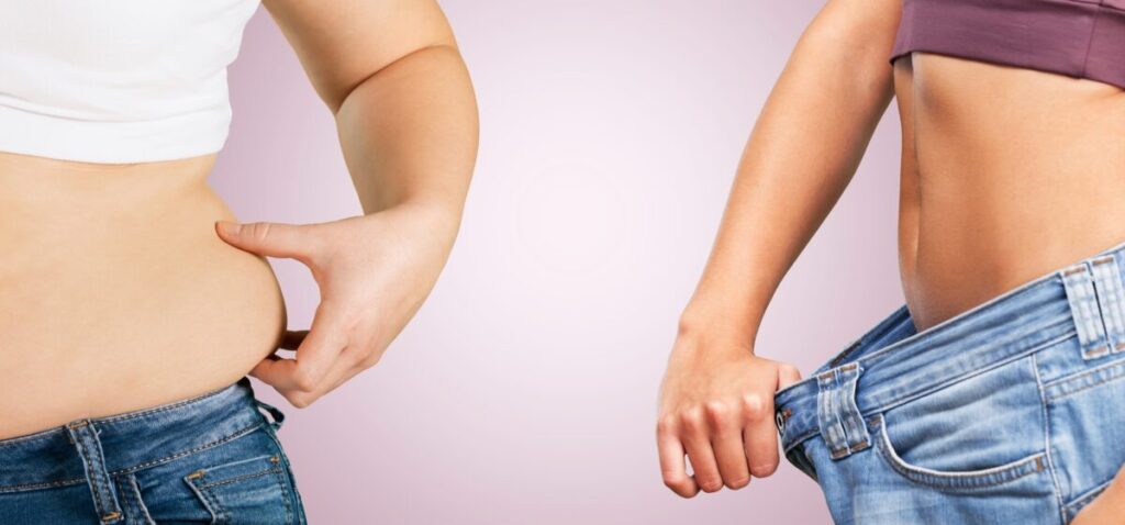 A comparison image showing the transformative power of weight loss, with one individual holding excess waist fat and another displaying a slimmer waist with loose jeans, highlighting the positive impact of cardio and healthy habits on heart health, as supported by training at Virgin Active The Sanctuary in Somerset West.